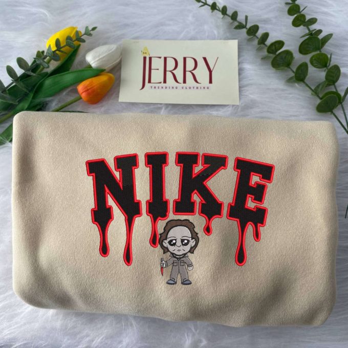 Stay Cozy In Style With Michael Myers Nike Embroidered Sweatshirt – Exclusive Knife Design 2