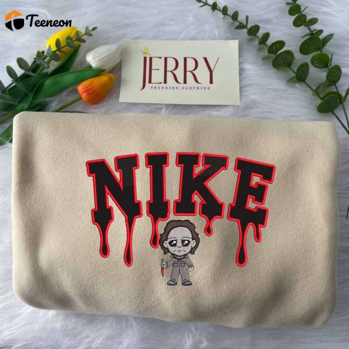 Stay Cozy In Style With Michael Myers Nike Embroidered Sweatshirt – Exclusive Knife Design 1