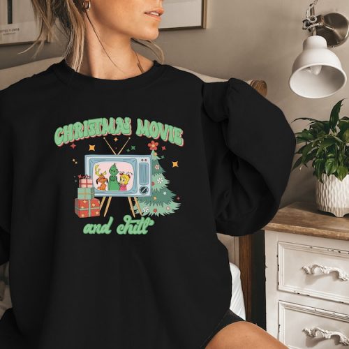 Cozy up this holiday season with our Christmas Movie and Chill Sweatshirt – the perfect attire for festive movie nights! 🎄❄️