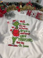 Cozy up in style with the Grinch Small Heart Sweatshirt – perfect for the holidays!