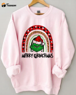 Get Festive with the Merry Grinchmas Loose Sweatshirt – Perfect Holiday Apparel!