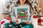 Spread Holiday Cheer with a Merry Grinchmas Sweatshirt – Festive & Comfy Attire!