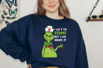 Get Festive with our Retro Grinch Shirt – Perfect Holiday Christmas Attire!