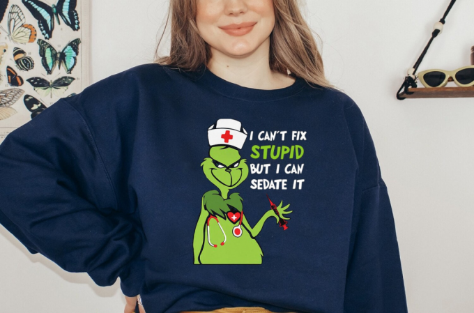 Get Festive With Our Retro Grinch Shirt – Perfect Holiday Christmas Attire!