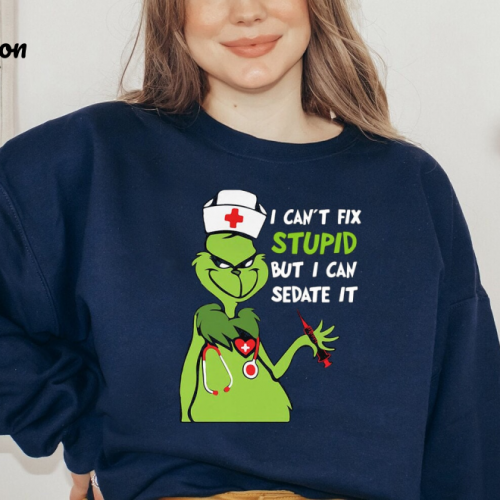 Get Festive with our Retro Grinch Shirt – Perfect Holiday Christmas Attire!