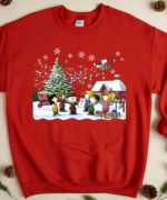 Snoopy Merry Christmas Singing Shirt: Spread Holiday Cheer with this Adorable and Musical Apparel