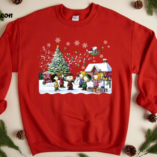 Snoopy Merry Christmas Singing Shirt: Spread Holiday Cheer with this Adorable and Musical Apparel